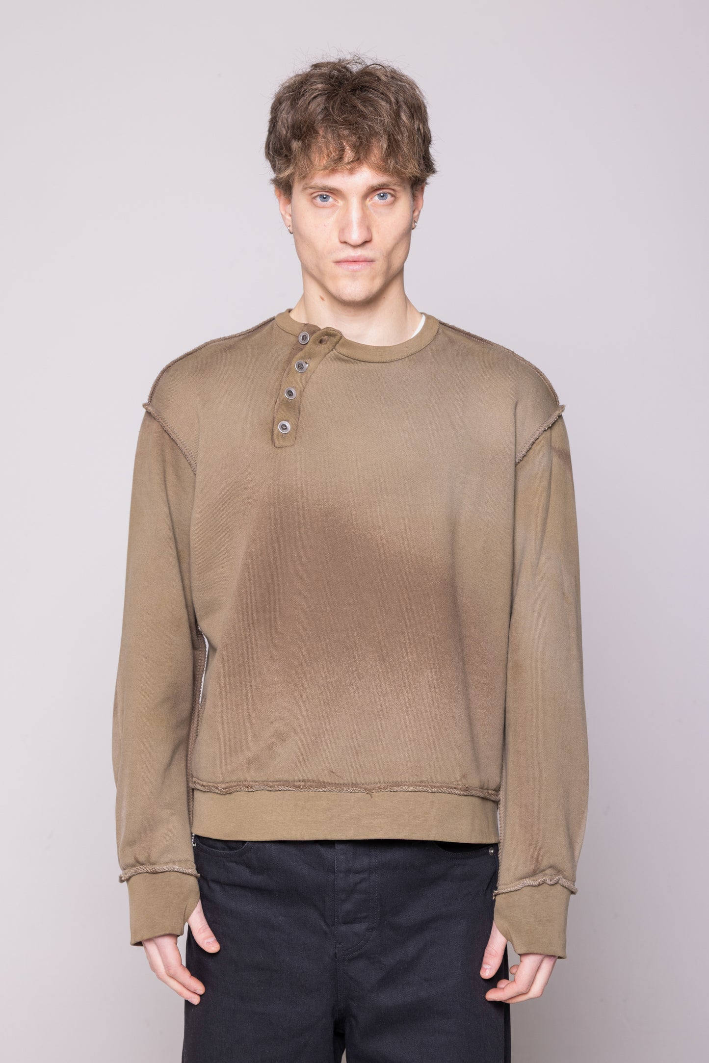 ASYMMETRIC BUTTON CHEST RAW CREWNECK